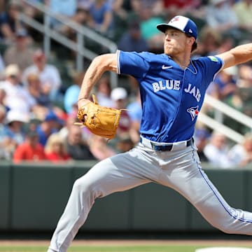 Mar 1, 2025; North Port, Florida, USA;  Toronto Blue Jays pitcher Josh Walker (21) throws a pitch during the fourth inning against the Atlanta Braves at CoolToday Park. Mandatory Credit: Kim Klement Neitzel-Imagn Images