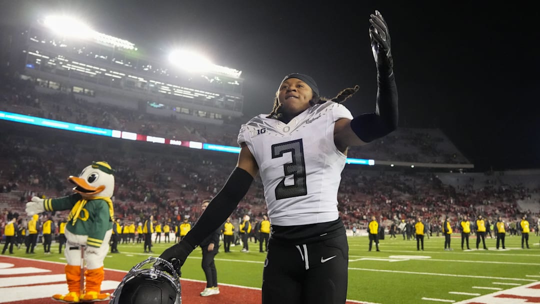 Nov 16, 2024; Madison, Wisconsin, USA;  Oregon Ducks defensive back Brandon Johnson (3) celebrates following the game against the Wisconsin Badgers at Camp Randall Stadium. Mandatory Credit: Jeff Hanisch-Imagn Images