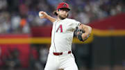 Mar 27, 2025; Phoenix, Arizona, USA; Arizona Diamondbacks pitcher Zac Gallen (23) pitches against the Chicago Cubs during the first inning at Chase Field. Mandatory Credit: Joe Camporeale-Imagn Images