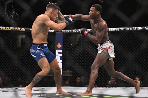 Terrance McKinney (red gloves) fights Esteban Ribovics (blue gloves) during UFC Fight Night at Enterprise Center.