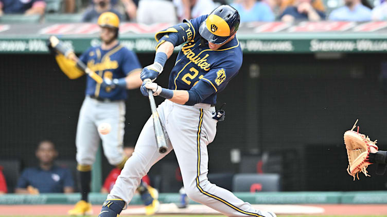 Jun 25, 2023; Cleveland, Ohio, USA; Milwaukee Brewers designated hitter Christian Yelich (22) hits