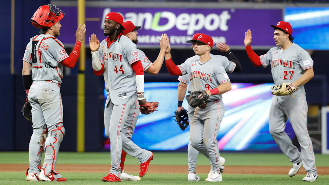 Apr 7, 2026; Miami, Florida, USA; The Cincinnati Reds celebrate their win against the Miami Marlins following the game at loanDepot Park.