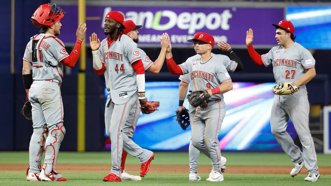 Apr 7, 2026; Miami, Florida, USA; The Cincinnati Reds celebrate their win against the Miami Marlins following the game at loanDepot Park. Apr 7, 2026; Miami, Florida, USA; The Cincinnati Reds celebrate their win against the Miami Marlins following the game at loanDepot Park.