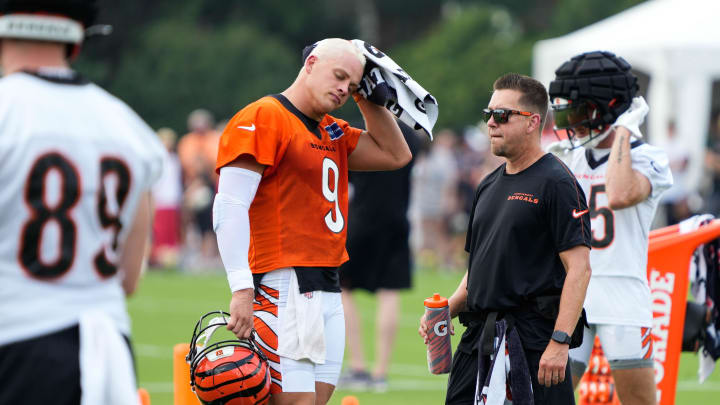 Bengals Joe Burrow takes a break from the heat during the first day of Bengals training camp on Wednesday July 24, 2024.