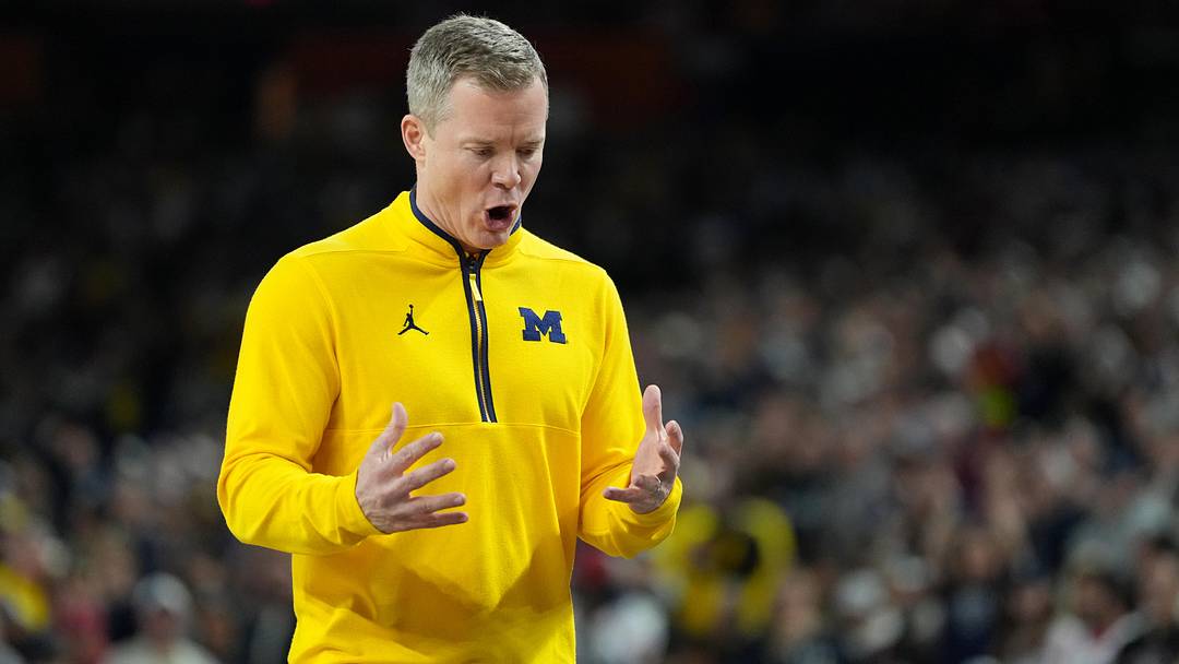 Apr 6, 2026; Indianapolis, IN, USA; Michigan Wolverines head coach Dusty May reacts after a play against the UConn Huskies during the first half in the national championship of the Final Four of the men's 2026 NCAA Tournament between the  and the Michigan Wolverines at Lucas Oil Stadium. Mandatory Credit: Bob Donnan-Imagn Images