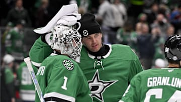 Mar 4, 2025; Dallas, Texas, USA; Dallas Stars goaltender Jake Oettinger (29) and goaltender Casey DeSmith (1) celebrate after the Stars defeat the New Jersey Devils at the American Airlines Center. Mandatory Credit: Jerome Miron-Imagn Images