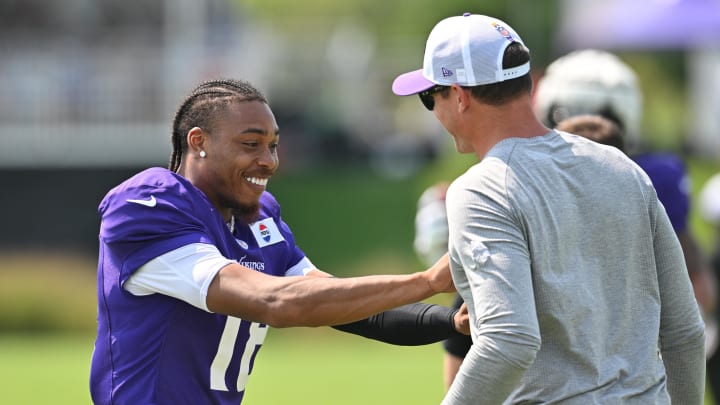 Aug 3, 2024; Eagan, MN, USA; Minnesota Vikings wide receiver Justin Jefferson (18) reacts with head coach Kevin O'Connell during practice at Vikings training camp in Eagan, MN. Mandatory Credit: Jeffrey Becker-USA TODAY Sports