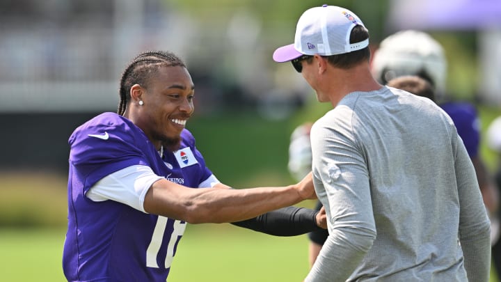 Aug 3, 2024; Eagan, MN, USA; Minnesota Vikings wide receiver Justin Jefferson (18) reacts with head coach Kevin O'Connell during practice at Vikings training camp in Eagan, MN. Mandatory Credit: Jeffrey Becker-USA TODAY Sports