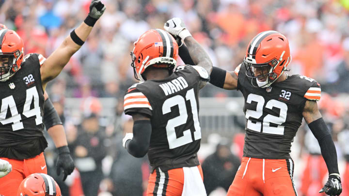 Sep 10, 2023; Cleveland, Ohio, USA; Cleveland Browns cornerback Denzel Ward (21) and safety Grant Delpit (22) celebrate after a third down stop during the first half against the Cleveland Browns at Cleveland Browns Stadium.