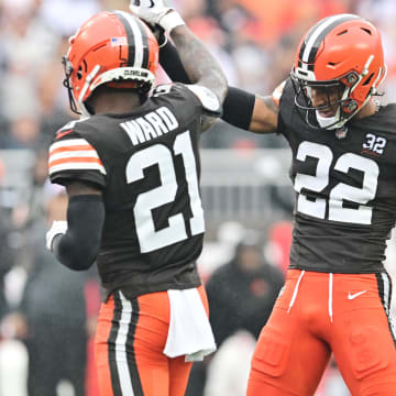Sep 10, 2023; Cleveland, Ohio, USA; Cleveland Browns cornerback Denzel Ward (21) and safety Grant Delpit (22) celebrate after a third down stop during the first half against the Cleveland Browns at Cleveland Browns Stadium. Mandatory Credit: Ken Blaze-USA TODAY Sports