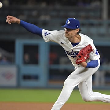 Los Angeles Dodgers relief pitcher Joe Kelly (99) delivers to the plate in the sixth inning against the Philadelphia Phillies at Dodger Stadium in 2024.