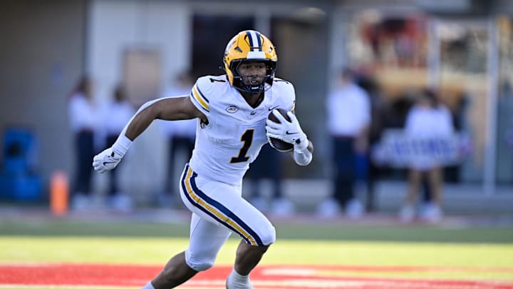 Nov 30, 2024; Dallas, Texas, USA; California Golden Bears running back Jaydn Ott (1) in action during the game between the SMU Mustangs and the California Golden Bears at Gerald J. Ford Stadium. Mandatory Credit: Jerome Miron-Imagn Images