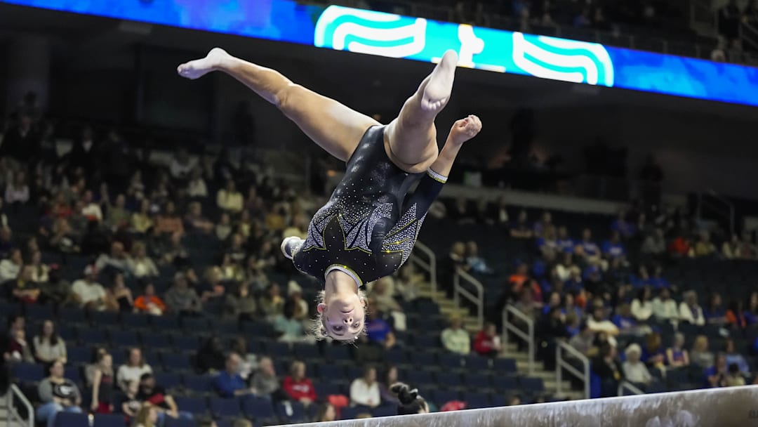 Mar 18, 2023; Duluth, GA, USA; Missouri Tigers gymnast Addison Lawrence on the balance beam during the SEC Gymnastics Championship at Gas South Arena. Mandatory Credit: Dale Zanine-Imagn Images