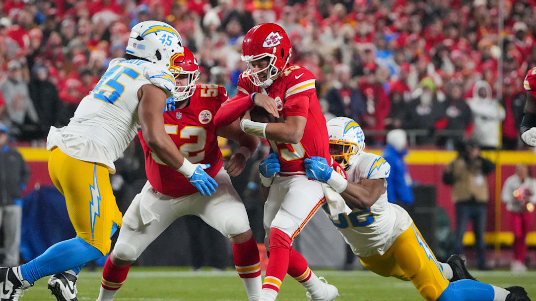 Dec 8, 2024; Kansas City, Missouri, USA; Kansas City Chiefs quarterback Patrick Mahomes (15) is sacked by Los Angeles Chargers linebacker Khalil Mack (52) during the first half at GEHA Field at Arrowhead Stadium. Mandatory Credit: Denny Medley-Imagn Images Dec 8, 2024; Kansas City, Missouri, USA; Kansas City Chiefs quarterback Patrick Mahomes (15) is sacked by Los Angeles Chargers linebacker Khalil Mack (52) during the first half at GEHA Field at Arrowhead Stadium. Mandatory Credit: Denny Medley-Imagn Images