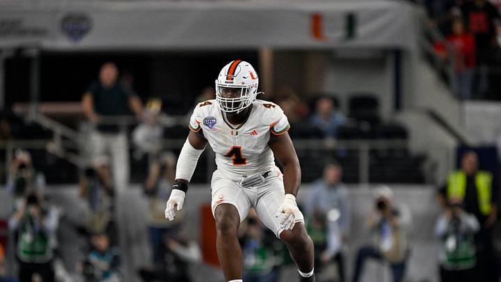 Dec 31, 2025; Arlington, TX, USA; Miami Hurricanes defensive lineman Rueben Bain Jr. (4) rushes the line during the 2025 Cotton Bowl and quarterfinal game of the College Football Playoff at AT&T Stadium. Mandatory Credit: Jerome Miron-Imagn Images