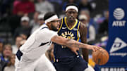 Oct 29, 2025; Dallas, Texas, USA; Dallas Mavericks forward Anthony Davis (3) controls the ball in front of Indiana Pacers forward Pascal Siakam (43) during the first quarter at the American Airlines Center. Mandatory Credit: Jerome Miron-Imagn Images
