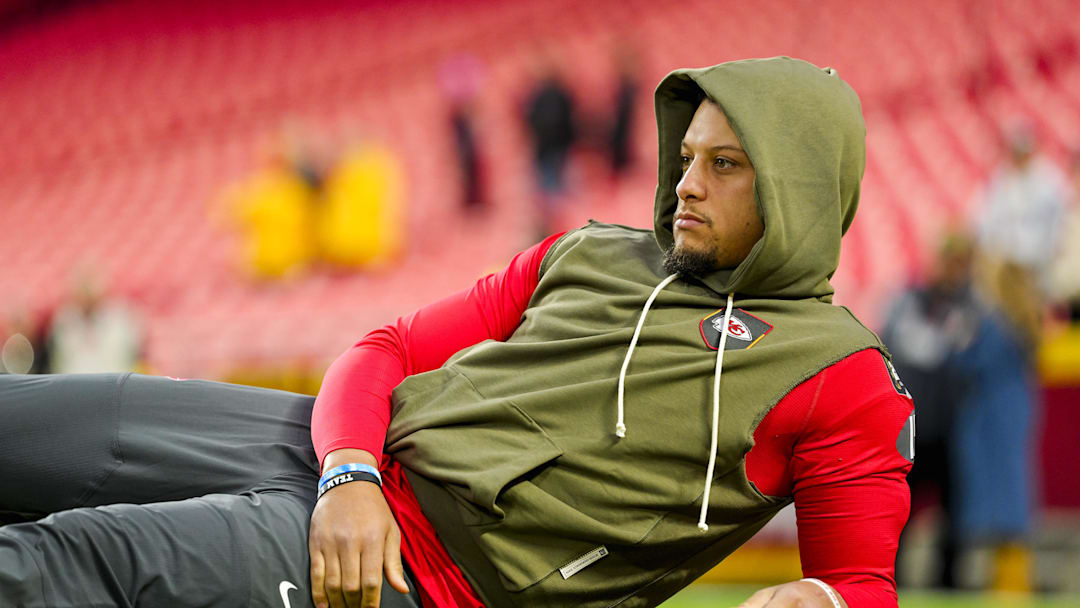 Chiefs quarterback Patrick Mahomes shared a joyous Christmas photo with his family in which he was seen wearing a leg brace following his ACL surgery.