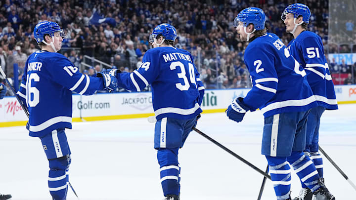 Apr 5, 2025; Toronto, Ontario, CAN; Toronto Maple Leafs center Auston Matthews (34) scores a goal and celebrates with right wing Mitch Marner (16) against the Columbus Blue Jackets during the third period at Scotiabank Arena. Mandatory Credit: Nick Turchiaro-Imagn Images