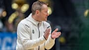 Mar 20, 2025; Seattle, WA, USA; Colorado State Rams head coach Niko Medved claps during practice at Climate Pledge Arena. Mandatory Credit: Stephen Brashear-Imagn Images