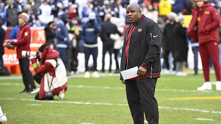 Jan 7, 2024; Landover, Maryland, USA; Washington Commanders offensive coordinator Eric Bieniemy on the field before the game against the Dallas Cowboys at FedExField. Mandatory Credit: Brad Mills-Imagn Images