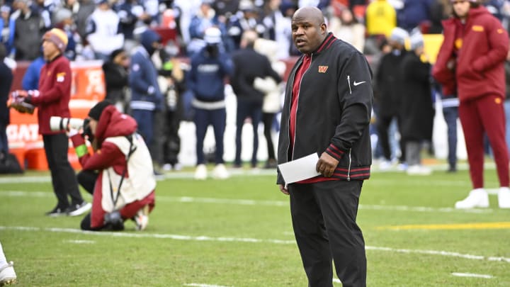 Jan 7, 2024; Landover, Maryland, USA; Washington Commanders offensive coordinator Eric Bieniemy on the field before the game against the Dallas Cowboys at FedExField. Mandatory Credit: Brad Mills-USA TODAY Sports