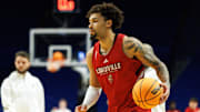 Mar 19, 2025; Lexington, KY, USA; Louisville Cardinals guard J'Vonne Hadley (1) handles the ball during practice at Rupp Arena. Mandatory Credit: Jordan Prather-Imagn Images