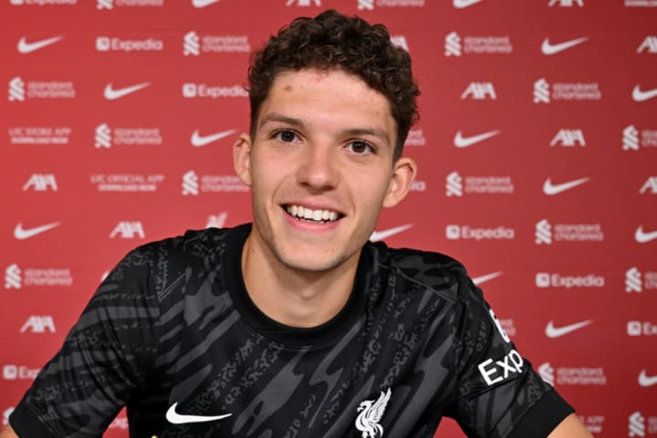 Armin Pecsi signing for Liverpool.