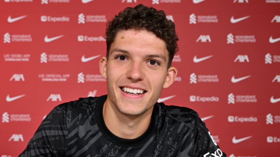 Armin Pecsi signing for Liverpool.