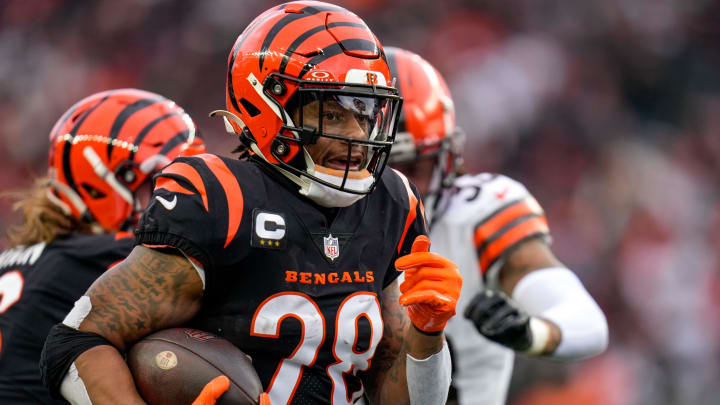 Cincinnati Bengals running back Joe Mixon (28) breaks away on a deep run in the first quarter of the NFL Week 18 game between the Cincinnati Bengals and the Cleveland Browns at Paycor Stadium in downtown Cincinnati on Sunday, Jan. 7, 2024.