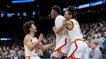 Maryland's Derik Queen celebrates with teammates after scoring the game-winning shot against Colorado State.