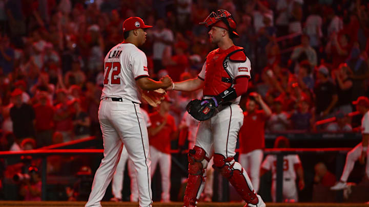 Jul 22, 2025; Washington, District of Columbia, USA; Washington Nationals starting pitcher Andry Lara (72) celebrates with catcher Riley Adams (15) after the game against the Cincinnati Reds at Nationals Park. Mandatory Credit: Brad Mills-Imagn Images