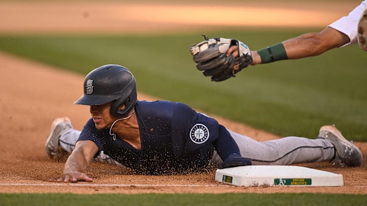 Seattle Mariners shortstop Leo Rivas steals third base during a game against the Oakland Athletics on Monday at Oakland Coliseum.