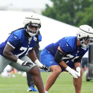 Jul 25, 2024; East Rutherford, NY, USA; New York Giants offensive tackle Joshua Ezeudu (75) participates in a drill during training camp at Quest Diagnostics Training Center.  