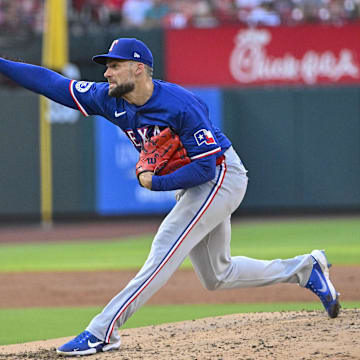 Jul 29, 2024; St. Louis, Missouri, USA;  Texas Rangers starting pitcher Nathan Eovaldi (17) pitches against the St. Louis Cardinals during the second inning at Busch Stadium. 