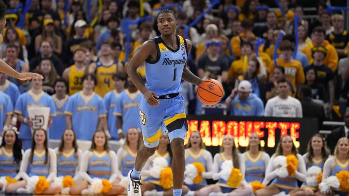 Nov 19, 2024; Milwaukee, Wisconsin, USA;  Marquette Golden Eagles guard Kam Jones (1) during the game against the Purdue Boilermakers at Fiserv Forum. Mandatory Credit: Jeff Hanisch-Imagn Images
