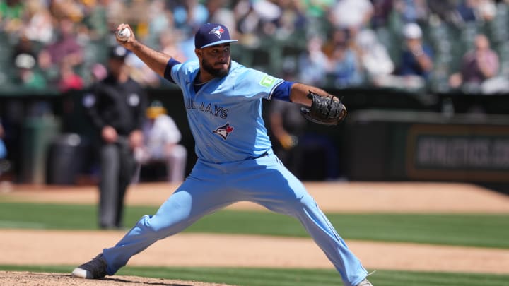 Jun 9, 2024; Oakland, California, USA; Toronto Blue Jays relief pitcher Yimi Garcia (93) throws a pitch against the Oakland Athletics during the ninth inning at Oakland-Alameda County Coliseum.