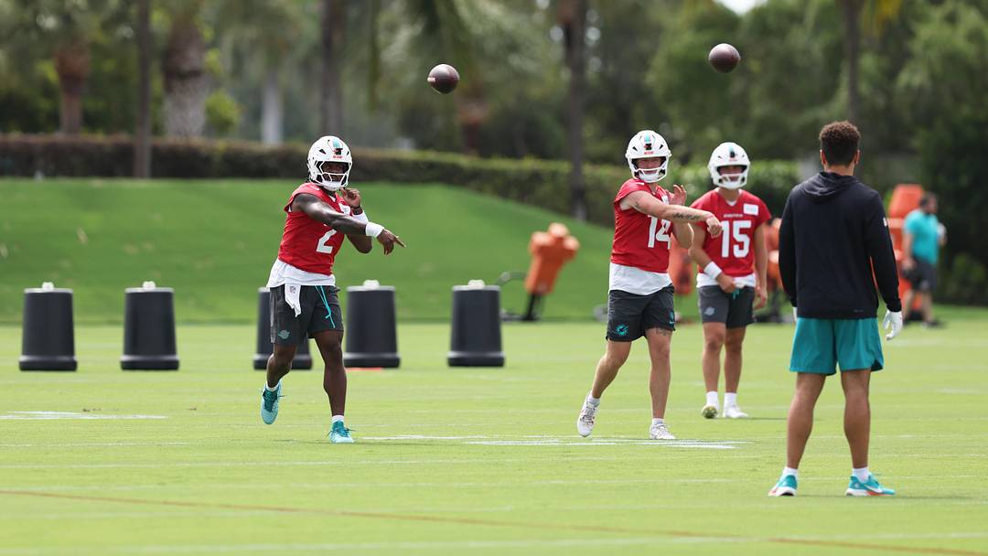 Miami Dolphins quarterback Malik Willis (2) and backup quarterback Quinn Ewers (14) throwing during minicamp with Cam Miller (15) observing at the Baptist Health Training Complex. Miami Dolphins quarterback Malik Willis (2) and backup quarterback Quinn Ewers (14) throwing during minicamp with Cam Miller (15) observing at the Baptist Health Training Complex.