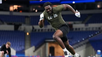 Mar 2, 2023; Indianapolis, IN, USA; Kansas linebacker Lonnie Phelps (LB25) participates in drills during the NFL Combine at Lucas Oil Stadium. Mandatory Credit: Kirby Lee-USA TODAY Sports