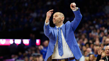 Dec 14, 2024; Lexington, Kentucky, USA; Kentucky Wildcats head coach Mark Pope directs his players during the second half against the Louisville Cardinals at Rupp Arena at Central Bank Center. Mandatory Credit: Jordan Prather-Imagn Images
