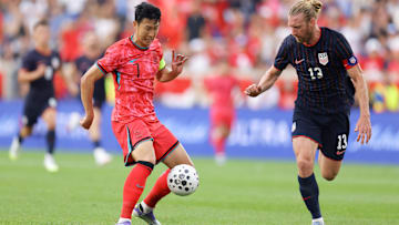 Tim Ream defends Son Heung-min in the USMNT's 2-0 loss to South Korea.