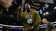 Boston Celtics former player Paul Pierce looks into a video camera on the court before game two of the 2024 NBA Finals.