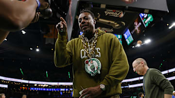 Boston Celtics former player Paul Pierce looks into a video camera on the court before game two of the 2024 NBA Finals.