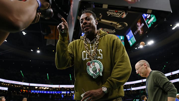Boston Celtics former player Paul Pierce looks into a video camera on the court before game two of the 2024 NBA Finals. Boston Celtics former player Paul Pierce looks into a video camera on the court before game two of the 2024 NBA Finals.