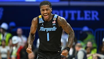 Jan 28, 2025; Indianapolis, Indiana, USA; Marquette Golden Eagles guard Kam Jones (1) celebrates after defeating the Butler Bulldogs at Hinkle Fieldhouse. Mandatory Credit: Robert Goddin-Imagn Images