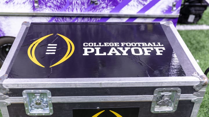 Jan 1, 2024; New Orleans, LA, USA; A general view of the College Football Playoff logo on a case on the Washington Huskies sideline before the 2024 Sugar Bowl college football playoff semifinal game between the Texas Longhorns and the Washington Huskies at Caesars Superdome. Mandatory Credit: Stephen Lew-USA TODAY Sports