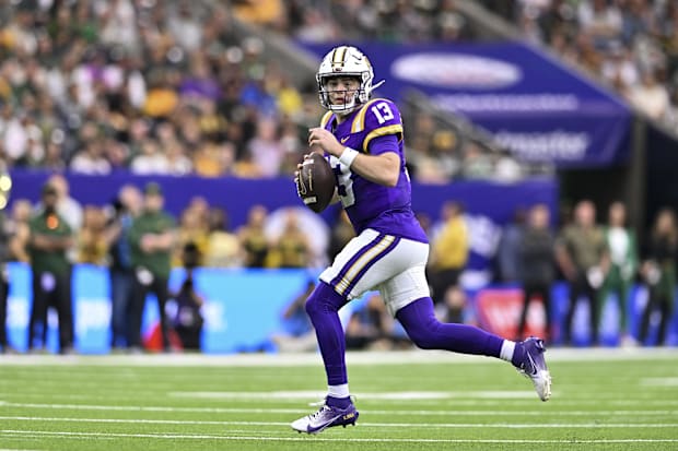 LSU Tigers quarterback Garrett Nussmeier runs the ball against the Baylor Bears.