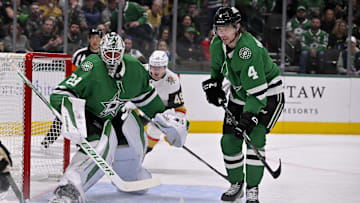 Jan 24, 2025; Dallas, Texas, USA; Dallas Stars goaltender Jake Oettinger (29) and defenseman Miro Heiskanen (4) in action during the game between the Dallas Stars and the Vegas Golden Knights at the American Airlines Center. Mandatory Credit: Jerome Miron-Imagn Images
