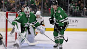 Jan 24, 2025; Dallas, Texas, USA; Dallas Stars goaltender Jake Oettinger (29) and defenseman Miro Heiskanen (4) in action during the game between the Dallas Stars and the Vegas Golden Knights at the American Airlines Center. Mandatory Credit: Jerome Miron-Imagn Images