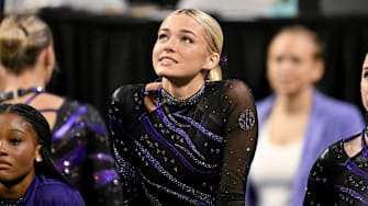 LSU Tigers gymnast Olivia Dunne cheers for the Tigers during the 2025 Women's National Gymnastics Semifinal at Dickies Arena.