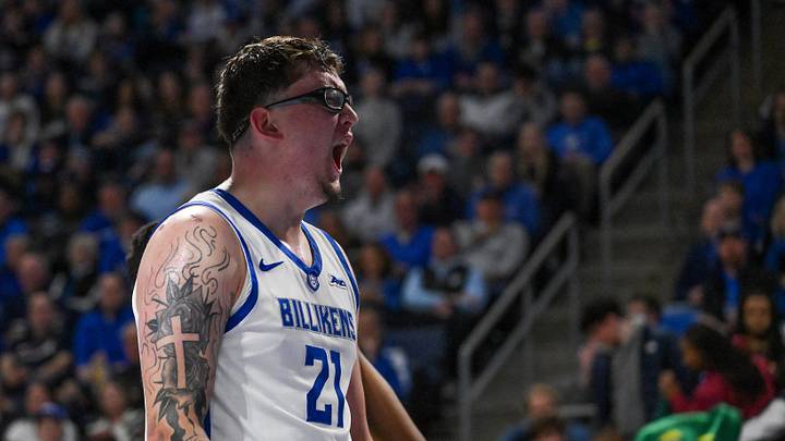 Feb 7, 2026; St. Louis, Missouri, USA;  Saint Louis Billikens center Robbie Avila (21) reacts after blocking a shot by La Salle Explorers forward Edwin Daniel (not pictured) during the second half at Chaifetz Arena. Mandatory Credit: Jeff Curry-Imagn Images